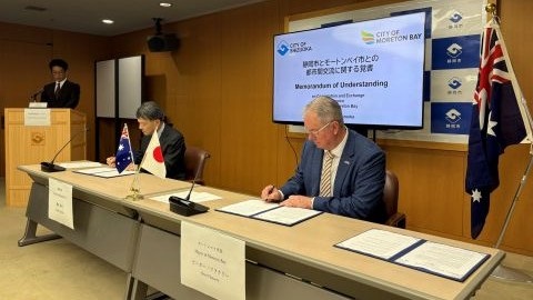 City of Moreton Bay Mayor Peter Flannery (right) and Mayor Takashi Namba of Shizuoka City, Japan, sign the memorandum. City of Moreton Bay Mayor Peter Flannery right and Mayor Takashi Namba of Shizuoka City sign the memorandum