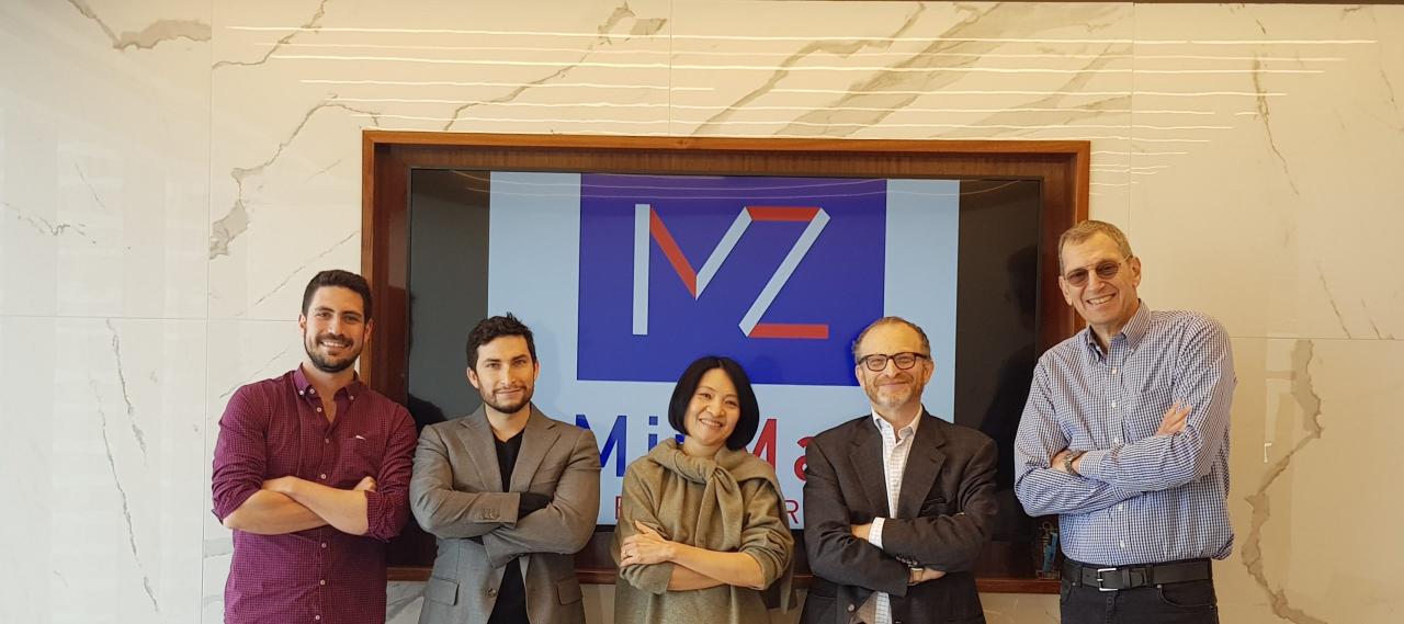 Aaron Applebaum (second from left) wtih founder Isaac Applebaum (second from right), Isaac Applbaum with fellow MixzMaa leadership team members Catherine Leung (centre), Rick Kaplan and Yoav Knoll.