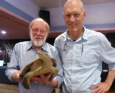 WPSQ state president Peter Ogilvie (left) and conservationist, entertainer and former Federal Government Minister Peter Garrett, who spoke at a Wildlife Queensland fundraising event, where he re-acquainted himself with an old friend, Travis the long-necked Mary River turtle.