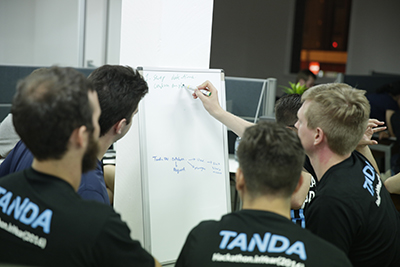 A Tanda Hackathon team hard at work over the ANZAC Day long weekend.